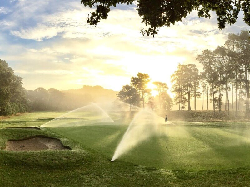 Parkstone Golf club, golf course, trees, water, clouds, golf trip, holidays in england